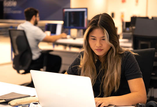 Engineer working at laptop